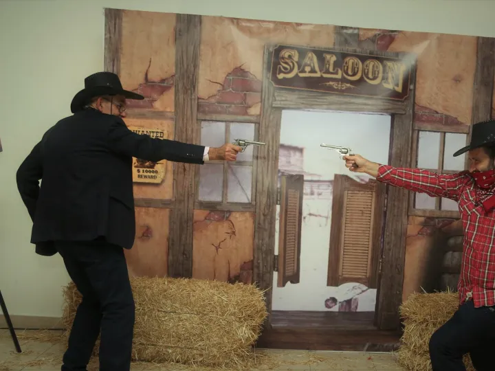 Mock cowboy duel in front of the saloon photocall