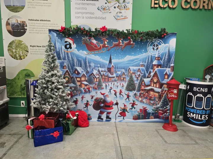 Printed Christmas photocall with tree and presents in an office