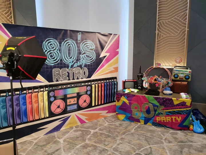 80s photocall set up in a function room with photo lights