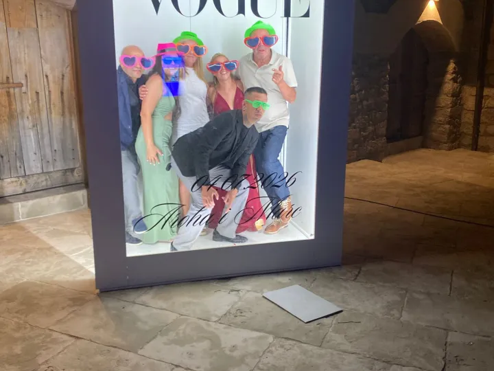Guests with props inside the giant Vogue cover