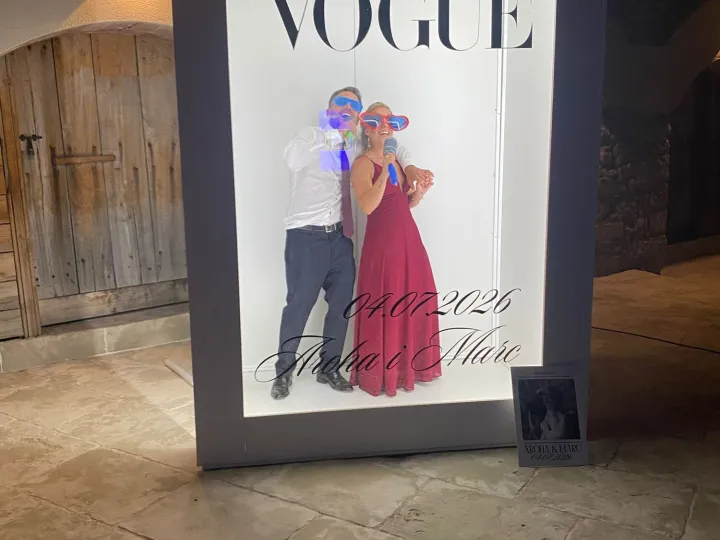 Wedding guests inside the Vogue photocall at night