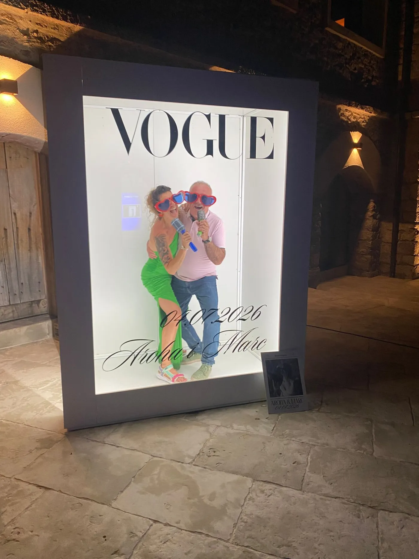 Couple wearing glasses and hats in the Vogue cover